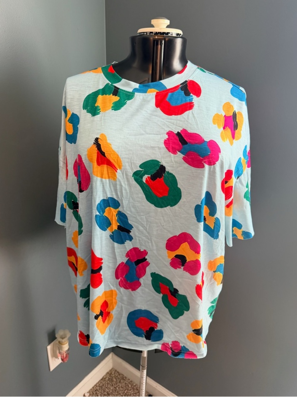 Women’s Light Blue Crewneck Top with Multicolor Abstract Print